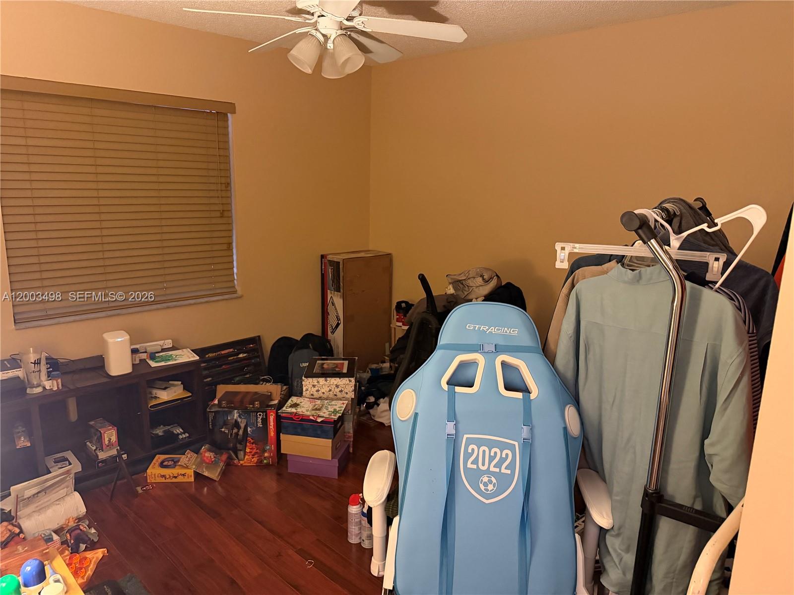 6010 Northwest 201st Lane Hialeah, FL 33015 - Photo 24 of 36 a view of a workspace with furniture and a window