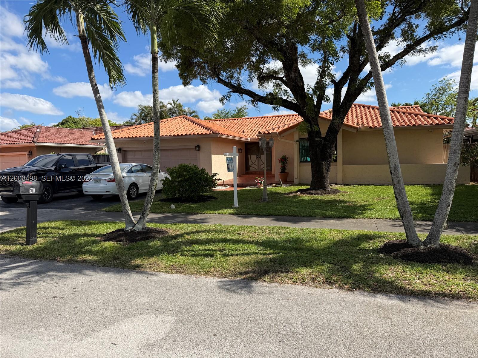 6010 Northwest 201st Lane Hialeah, FL 33015 - Photo 9 of 36 a view of a backyard