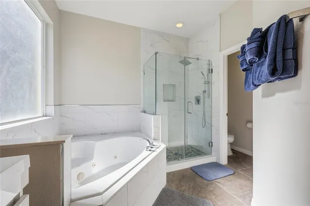 $690,000 | 959 Lake Berkley Drive, Kissimmee, FL 34746