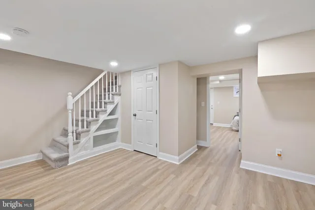 a view of entryway with wooden floor