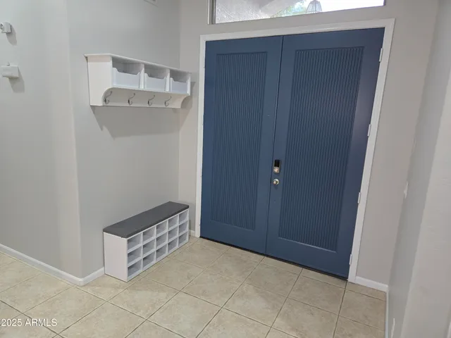 a kitchen with stainless steel appliances a refrigerator and a sink