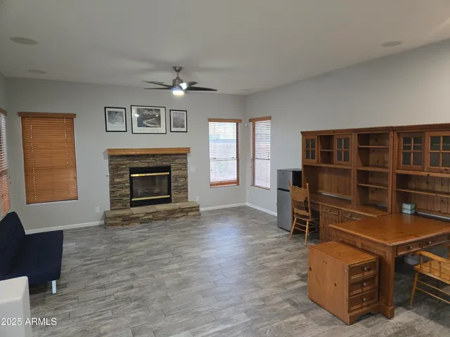 a room with furniture and a fireplace