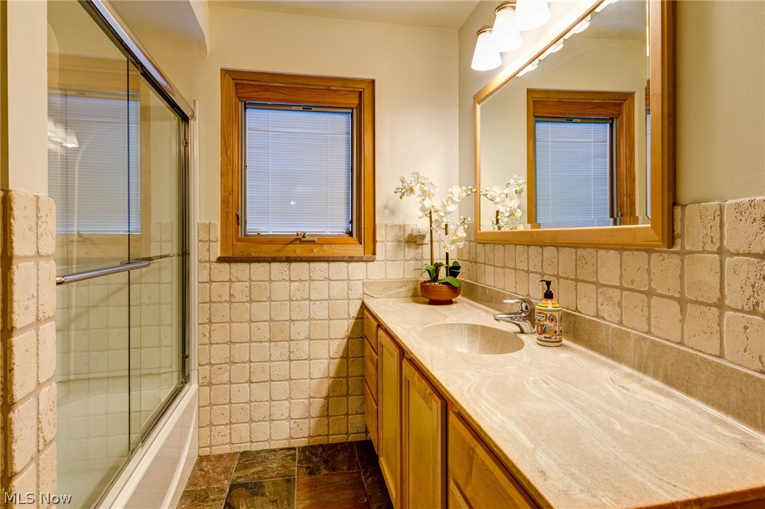 24150 Wimbledon Road Shaker Heights, OH 44122 - Photo 21 of 30 A bathroom serving two upstairs bedrooms has been updated.