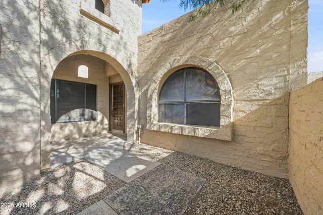 a view of a wooden door of a house