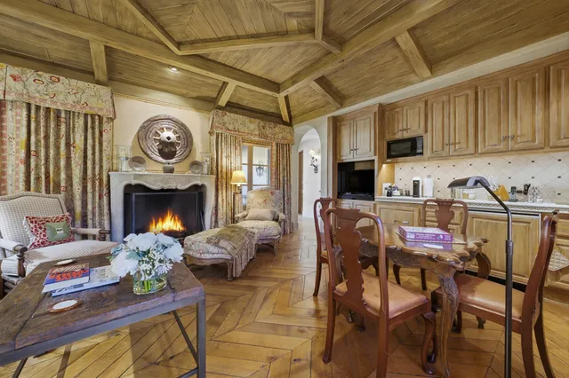 a view of a livingroom with furniture and a fireplace