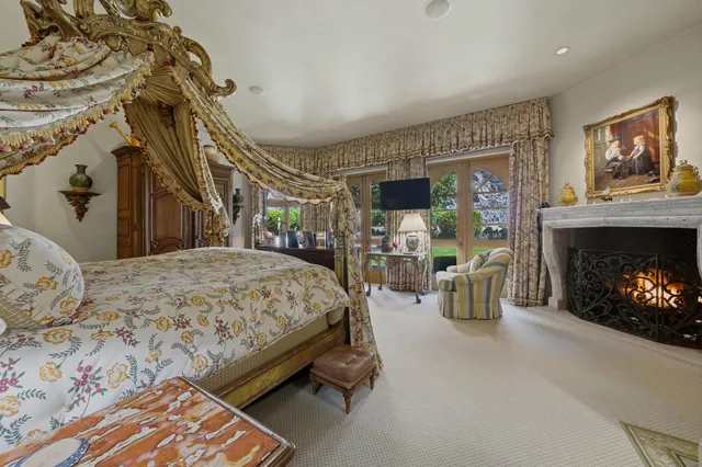 a bedroom with a bed and a couch