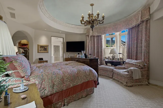 a view of a patio with a table chairs and a patio