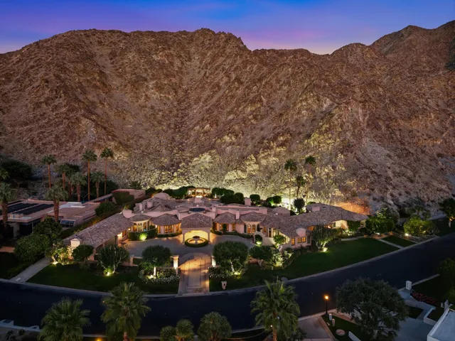 a bed room with a bed and a fireplace