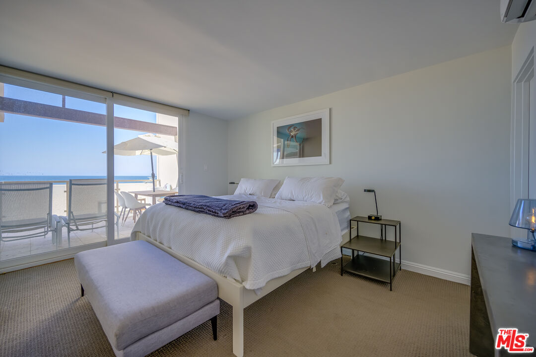 2 Ketch Street, Unit 107 Marina del Rey, CA 90292 - Photo 17 of 22 a bedroom with bed and window