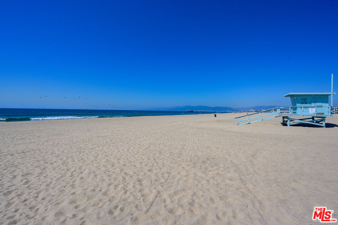 2 Ketch Street, Unit 107 Marina del Rey, CA 90292 - Photo 3 of 22 a view of a ocean with some trees