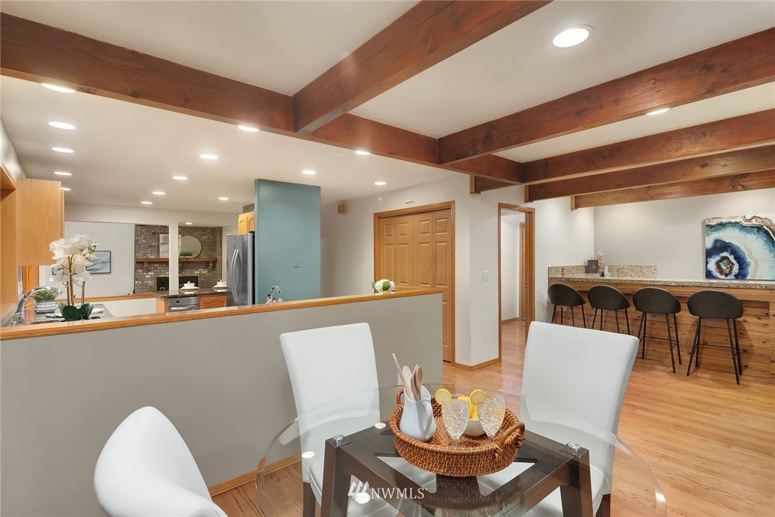 820 Carlson Road Snohomish, WA 98290 - Photo 14 of 39 a dining room with furniture and wooden floor