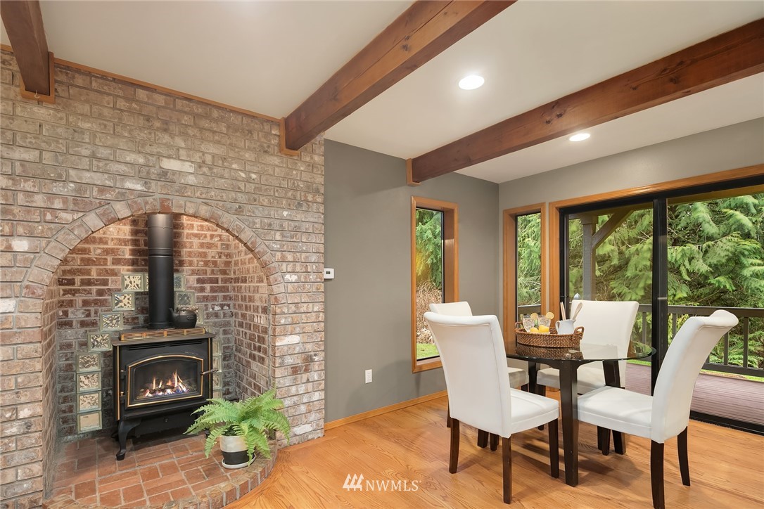820 Carlson Road Snohomish, WA 98290 - Photo 16 of 39 a living room with furniture and a fireplace