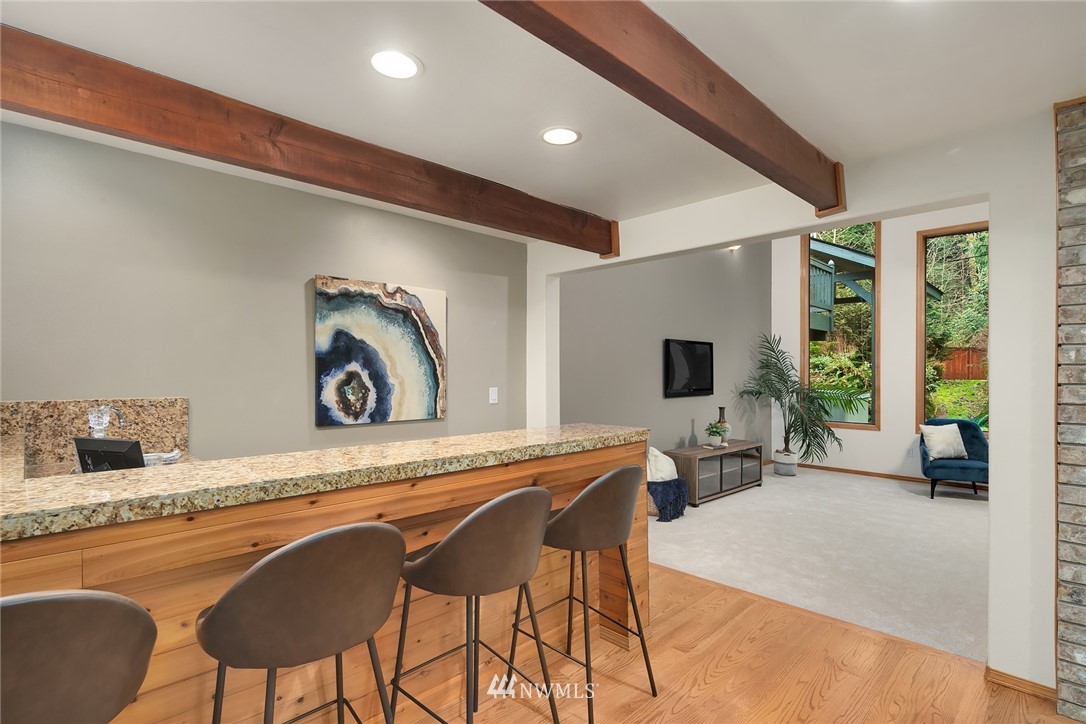 820 Carlson Road Snohomish, WA 98290 - Photo 19 of 39 a living room with a table and chairs