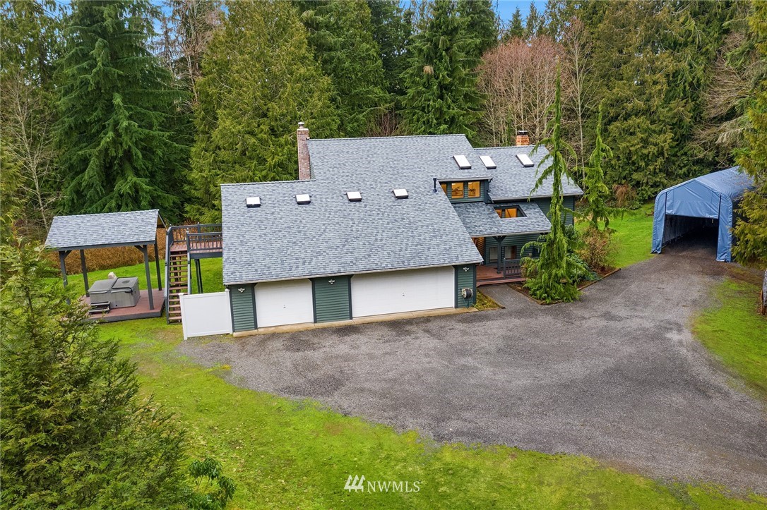 820 Carlson Road Snohomish, WA 98290 - Photo 2 of 39 an aerial view of a house with garden space and a house view