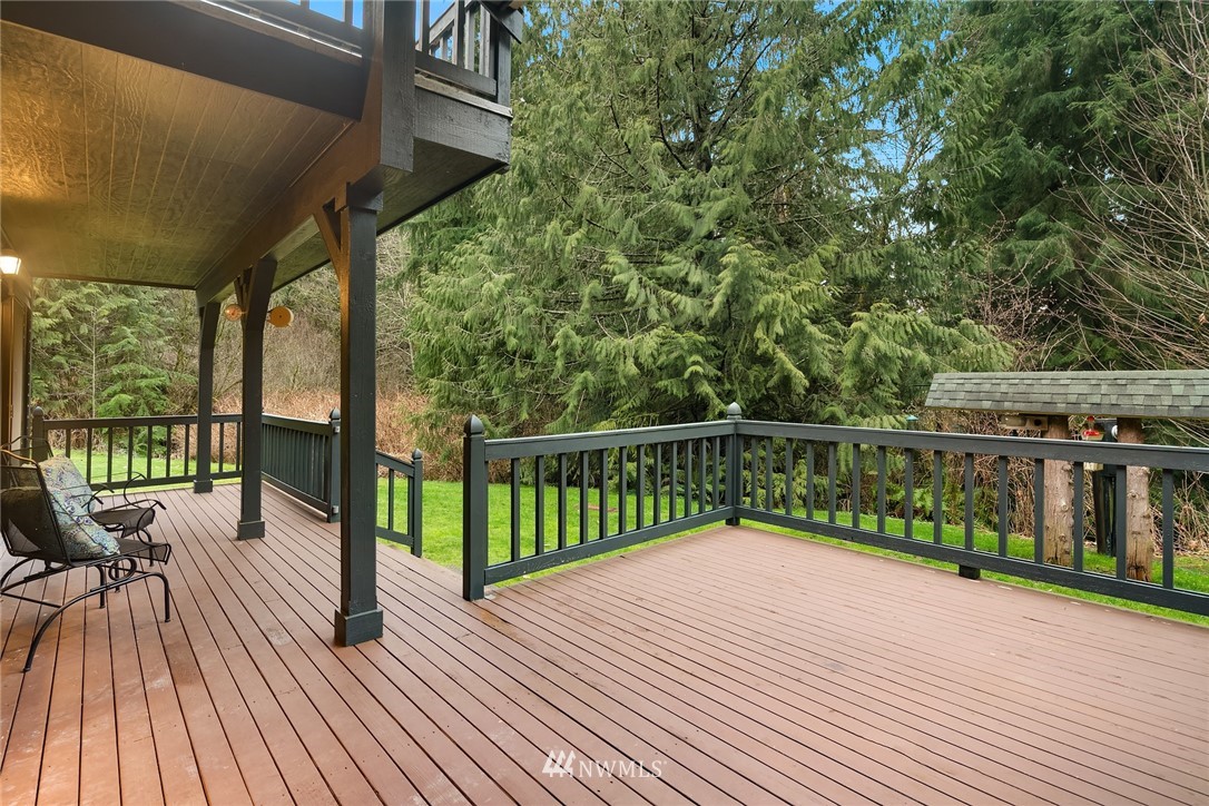 820 Carlson Road Snohomish, WA 98290 - Photo 21 of 39 a view of balcony with deck and wooden floor