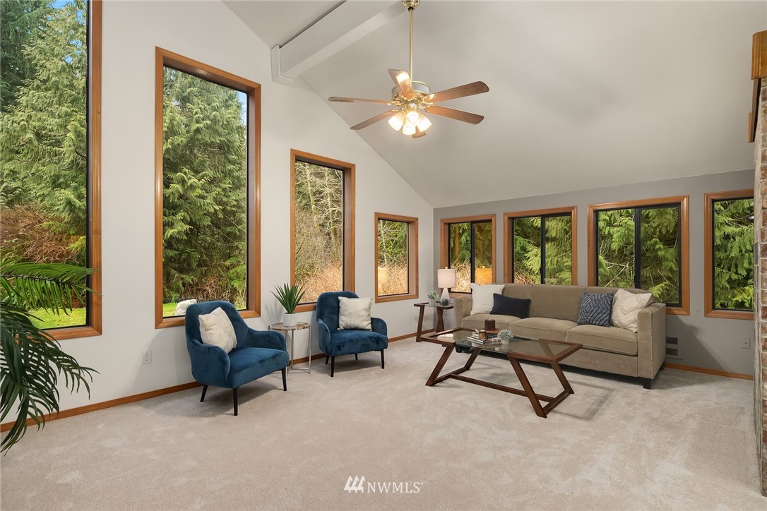 820 Carlson Road Snohomish, WA 98290 - Photo 24 of 39 a living room with furniture and a large window