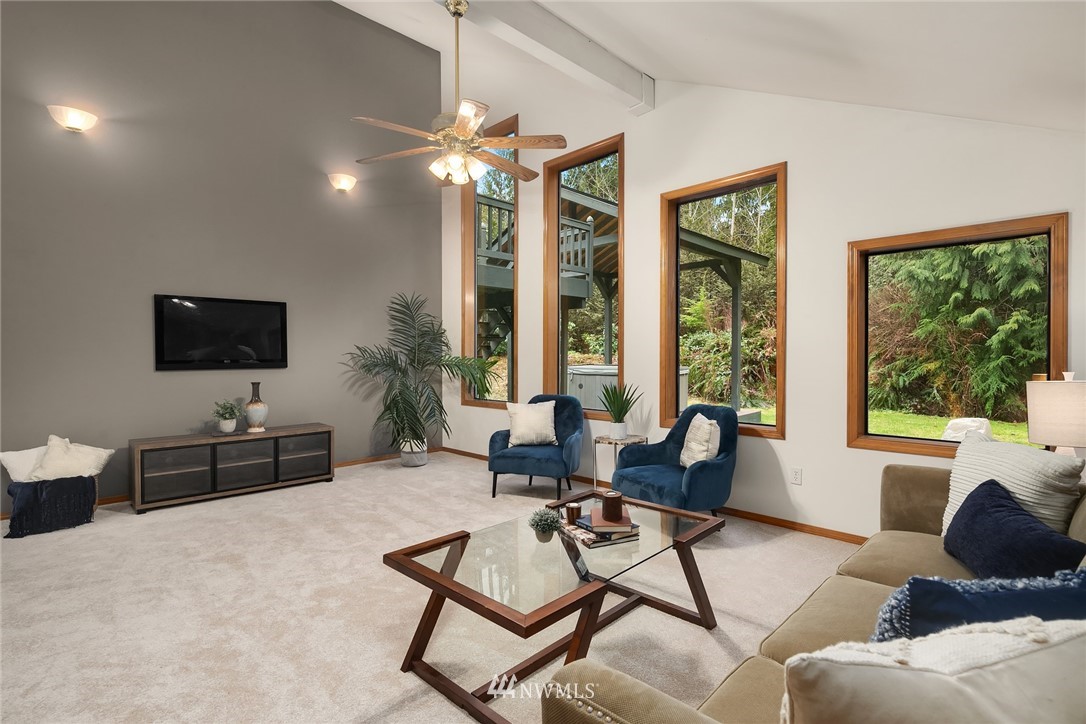 820 Carlson Road Snohomish, WA 98290 - Photo 25 of 39 a living room with furniture and a flat screen tv