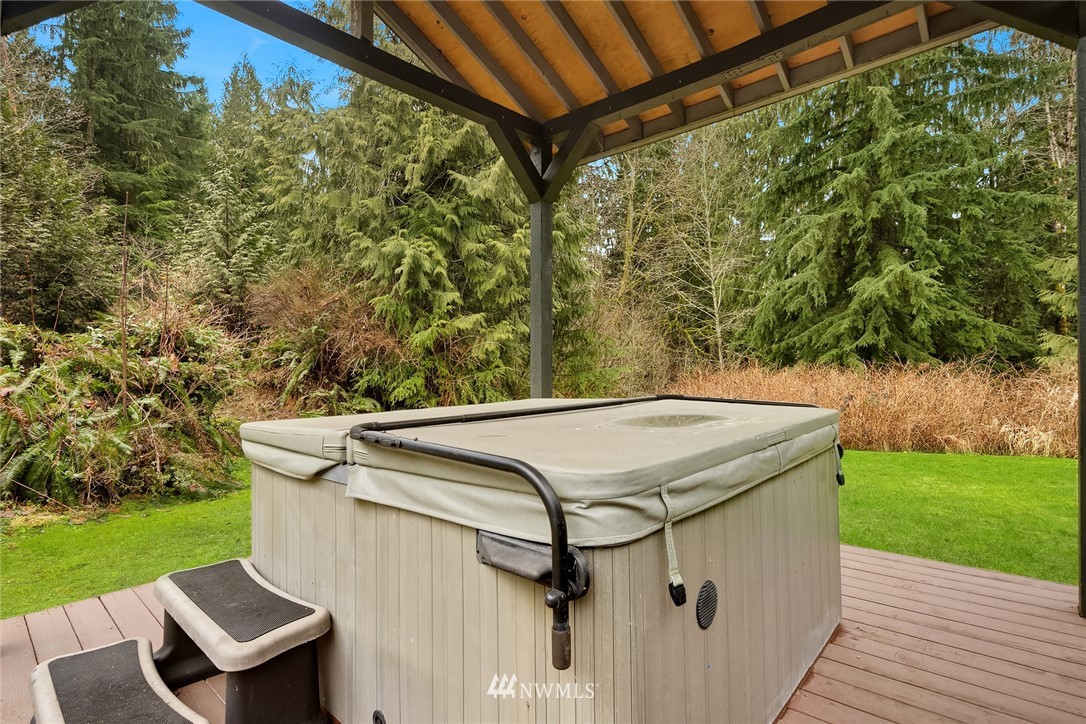 820 Carlson Road Snohomish, WA 98290 - Photo 36 of 39 a view of a backyard with wooden floor and a garden