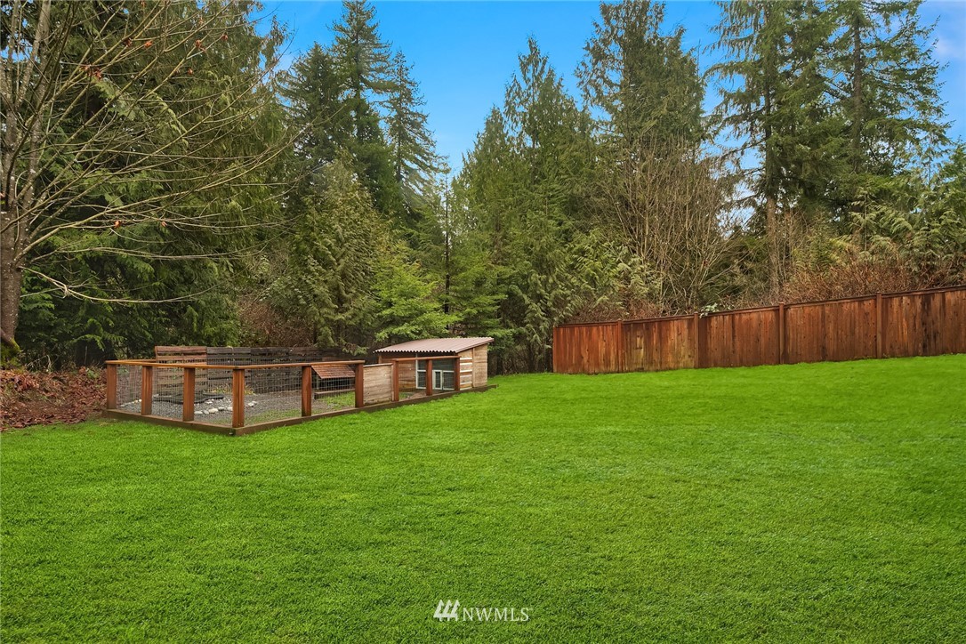 820 Carlson Road Snohomish, WA 98290 - Photo 4 of 39 a view of a house with a yard and sitting area