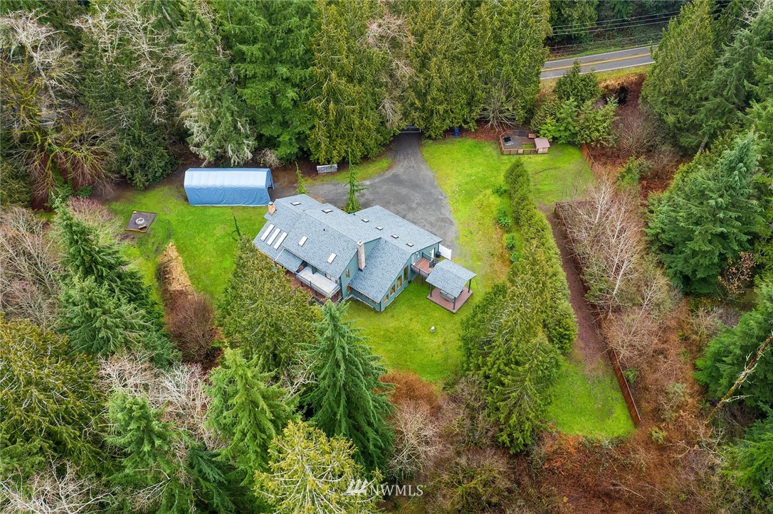 820 Carlson Road Snohomish, WA 98290 - Photo 6 of 39 an aerial view of a house with outdoor space pool seating area and yard