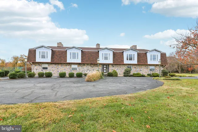 a view of a lake with a yard