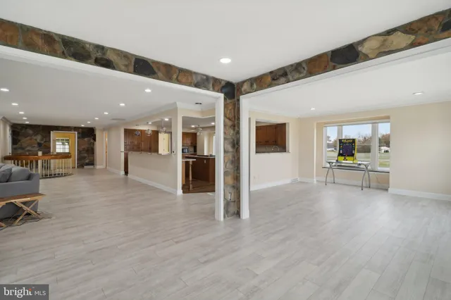 a view of kitchen with refrigerator sink and a counter top space