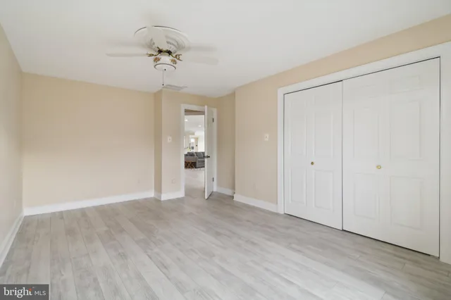 a view of a swimming pool with an outdoor space and seating area