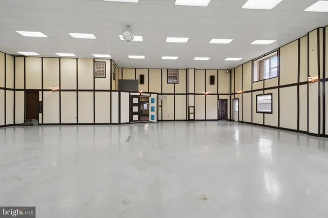 a picture of a bathroom with a shower