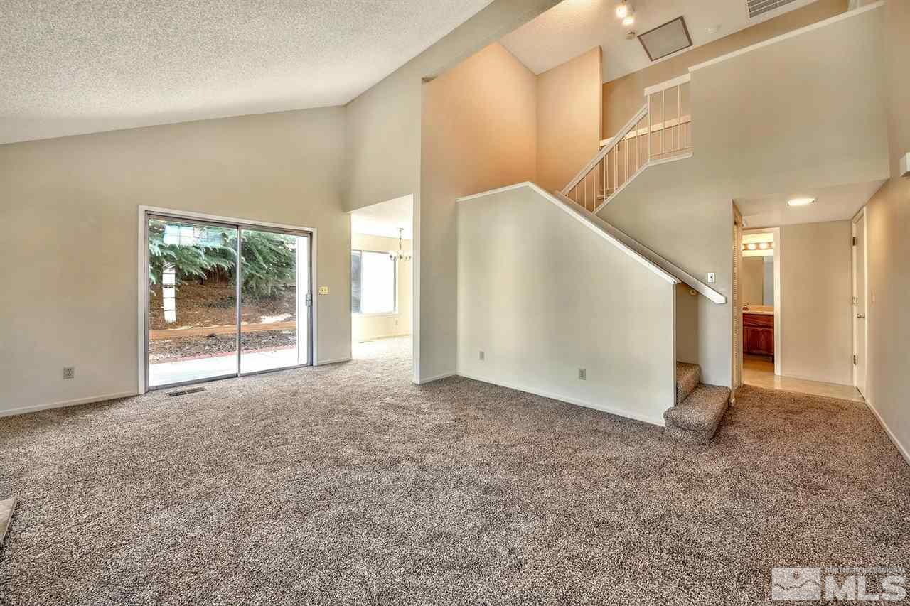 2702 Caballo Drive Reno, NV 89502 - Photo 4 of 17 a view of a big room with closet and windows