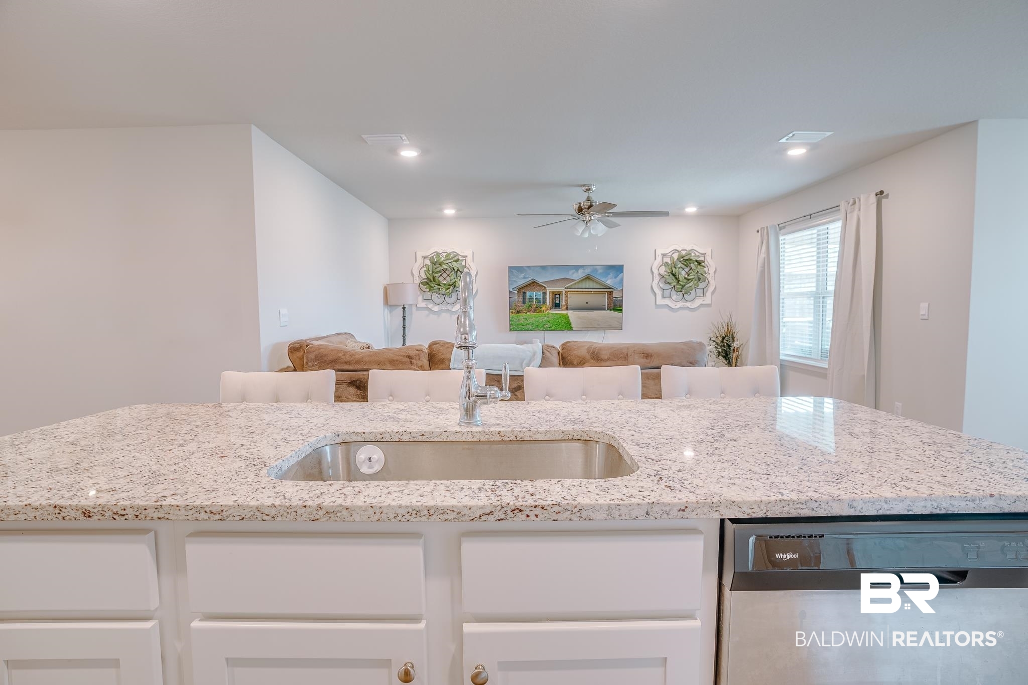 8242 Sycamore Way Semmes, AL 36575 - Photo 43 of 43 Kitchen featuring dishwasher, open floor plan, white cabinetry, light stone countertops, and recessed lighting