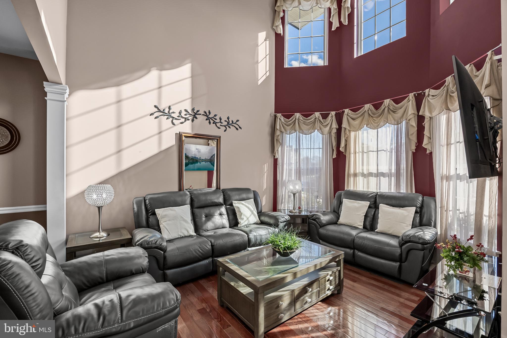 7 Manchester Court Wenonah, NJ 08090 - Photo 13 of 37 a living room with furniture and a large window