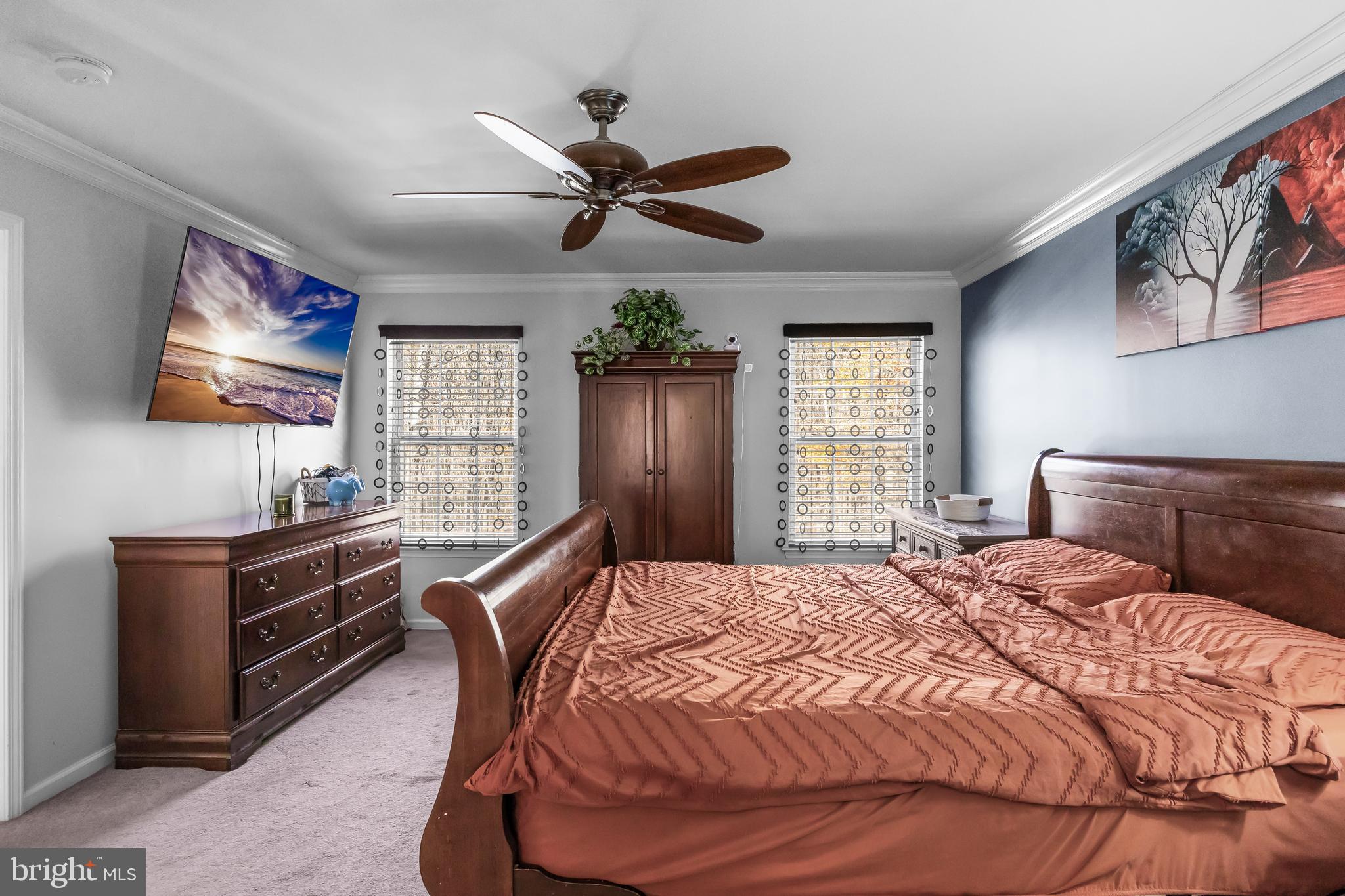 7 Manchester Court Wenonah, NJ 08090 - Photo 21 of 37 a bedroom with a bed and a flat screen tv