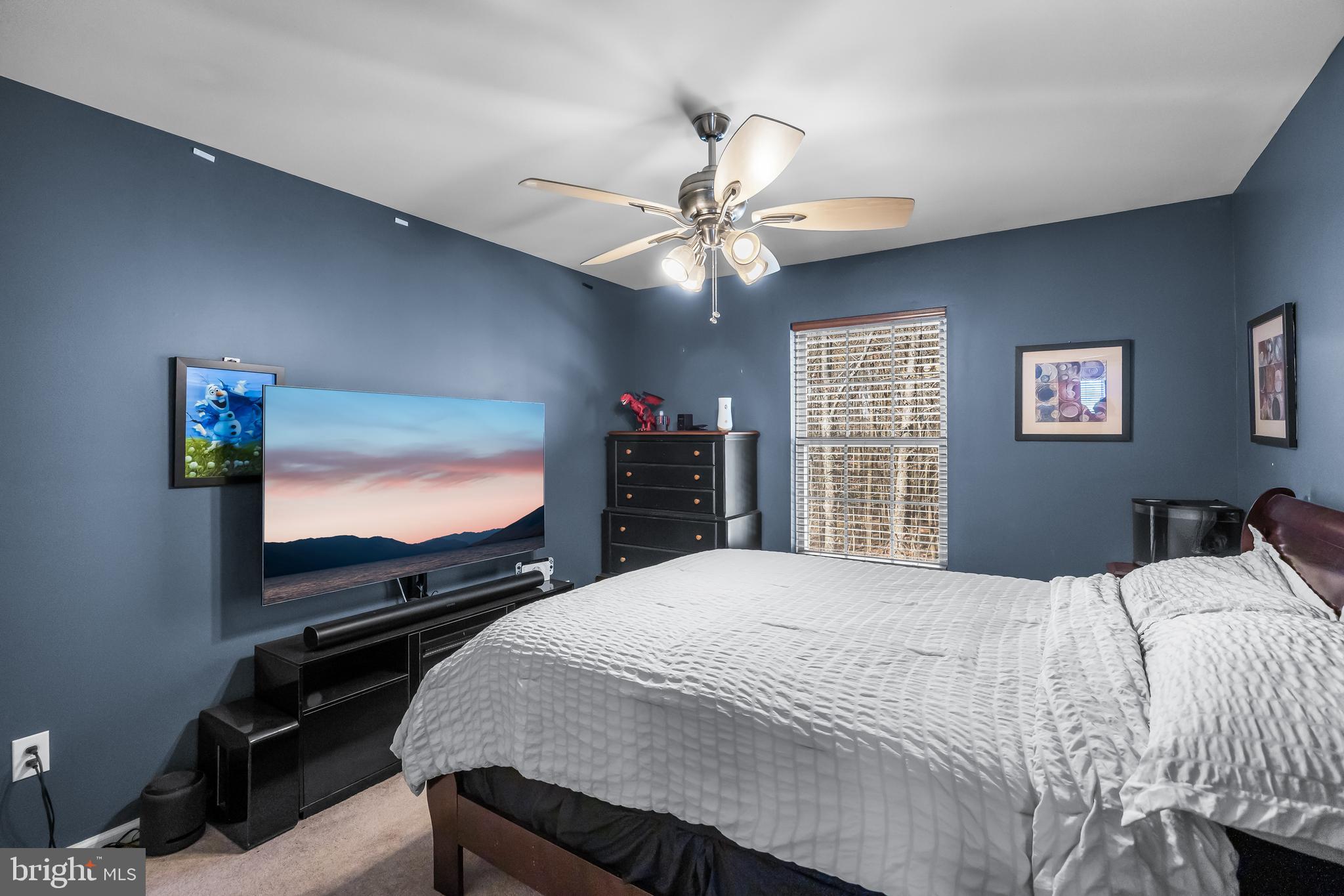 7 Manchester Court Wenonah, NJ 08090 - Photo 26 of 37 a bedroom with a bed and a flat screen tv