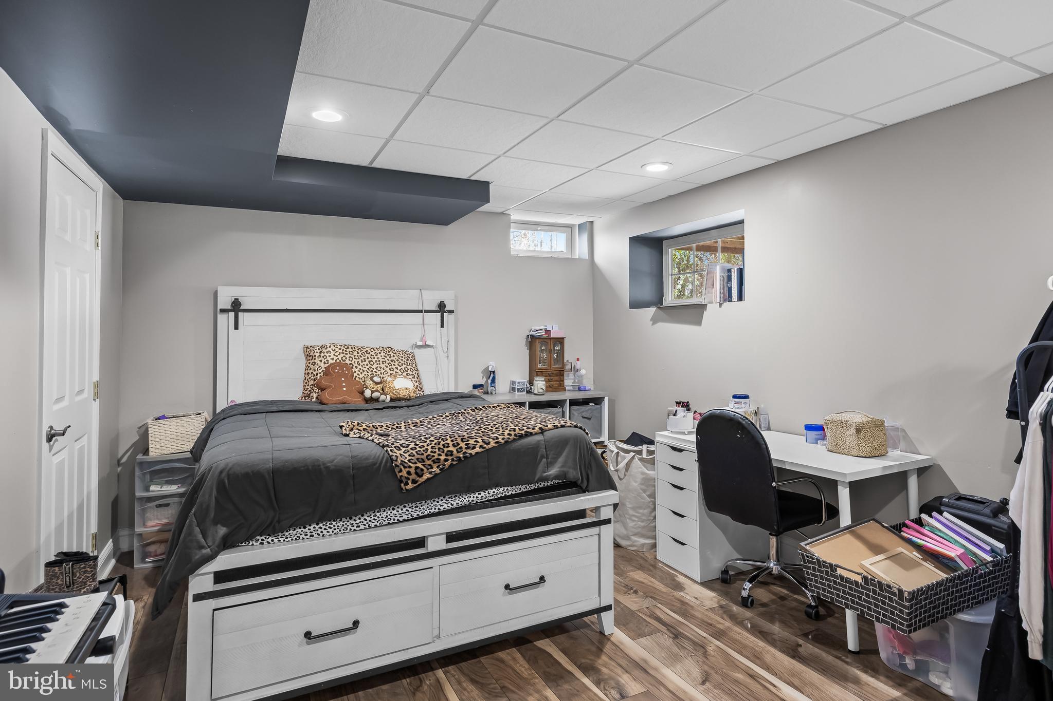 7 Manchester Court Wenonah, NJ 08090 - Photo 30 of 37 a bedroom with a bed and wooden floor