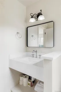 a bathroom with a shower and a bath tub