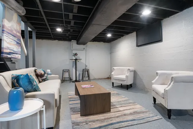 a view of entryway with wooden floor and stairs