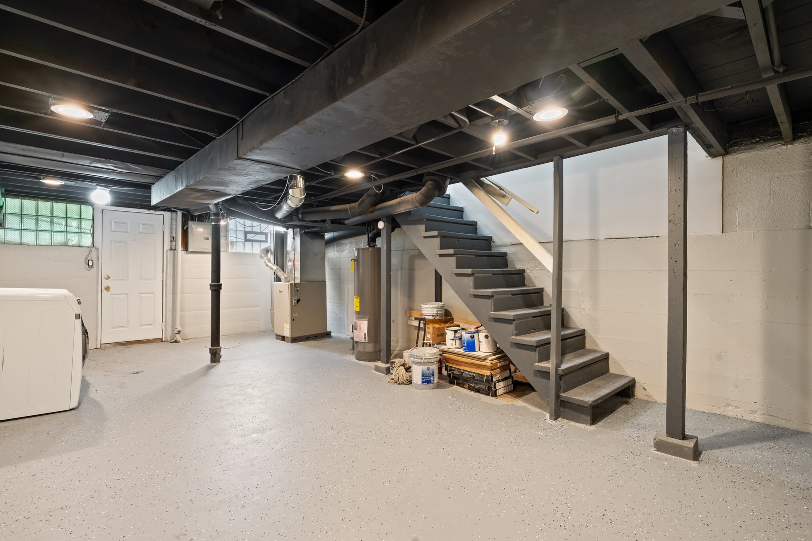 715 East 105th Place Chicago, IL 60628 - Photo 16 of 26 a view of room with gym equipment