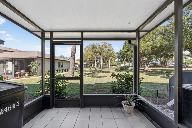 a room with window view and wooden floor