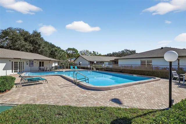 a view of a house with swimming pool