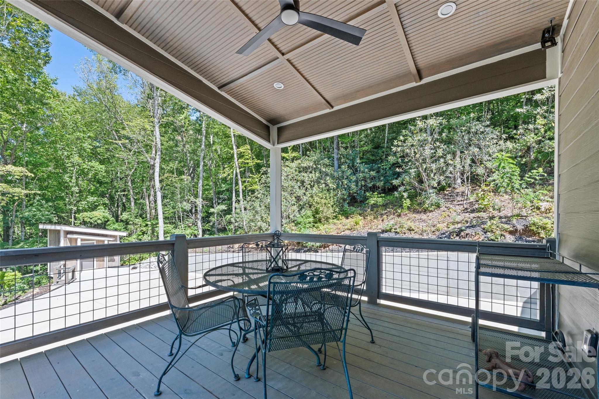 1185 Wallalieu Road Otto, NC 28763 - Photo 34 of 43 a view of a chairs and table in the balcony
