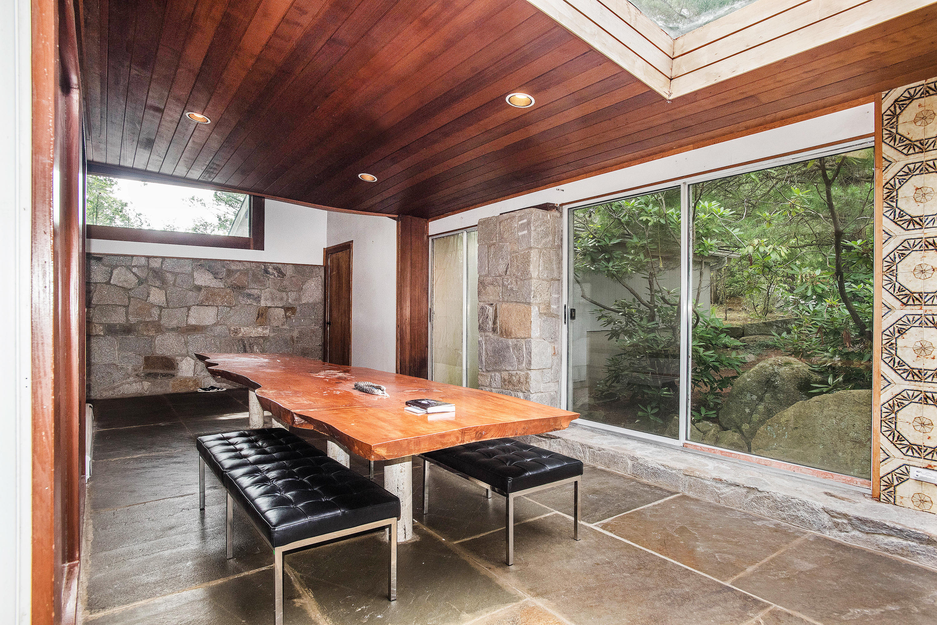 243 Smith Ridge Road New Canaan, CT 06840 - Photo 14 of 29 a outdoor dining space with furniture and wooden floor