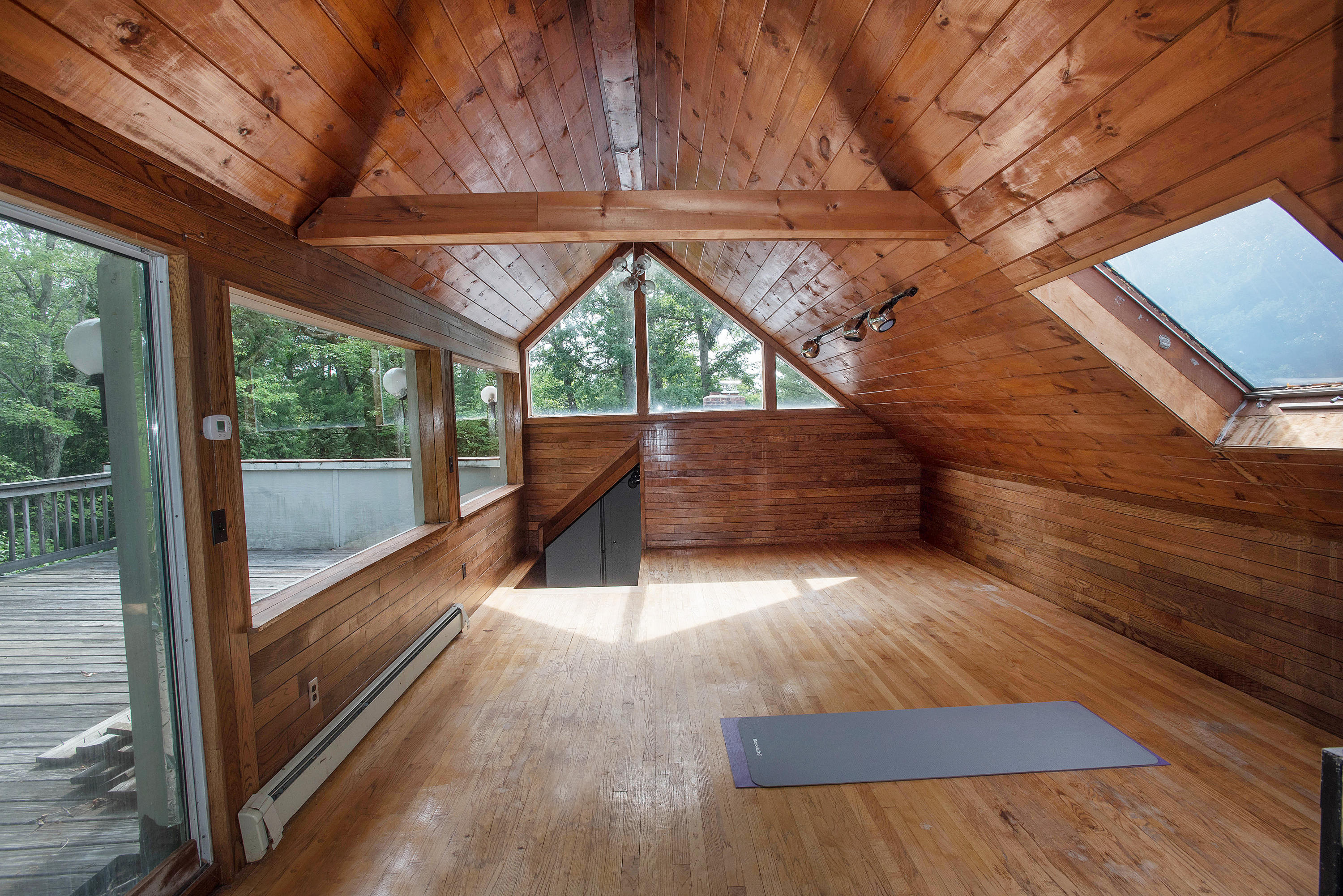 243 Smith Ridge Road New Canaan, CT 06840 - Photo 19 of 29 a view of porch with wooden floor