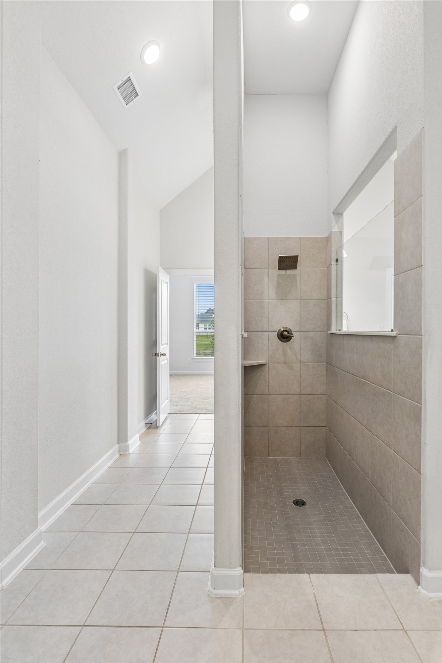 298 Wild Pecan Loop Buda, TX 78610 - Photo 24 of 40 a bathroom with a shower