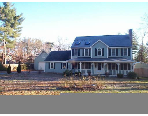 773 Reservoir Road Lunenburg, MA 01462 - Photo 1 of 1 a front view of a house with a yard