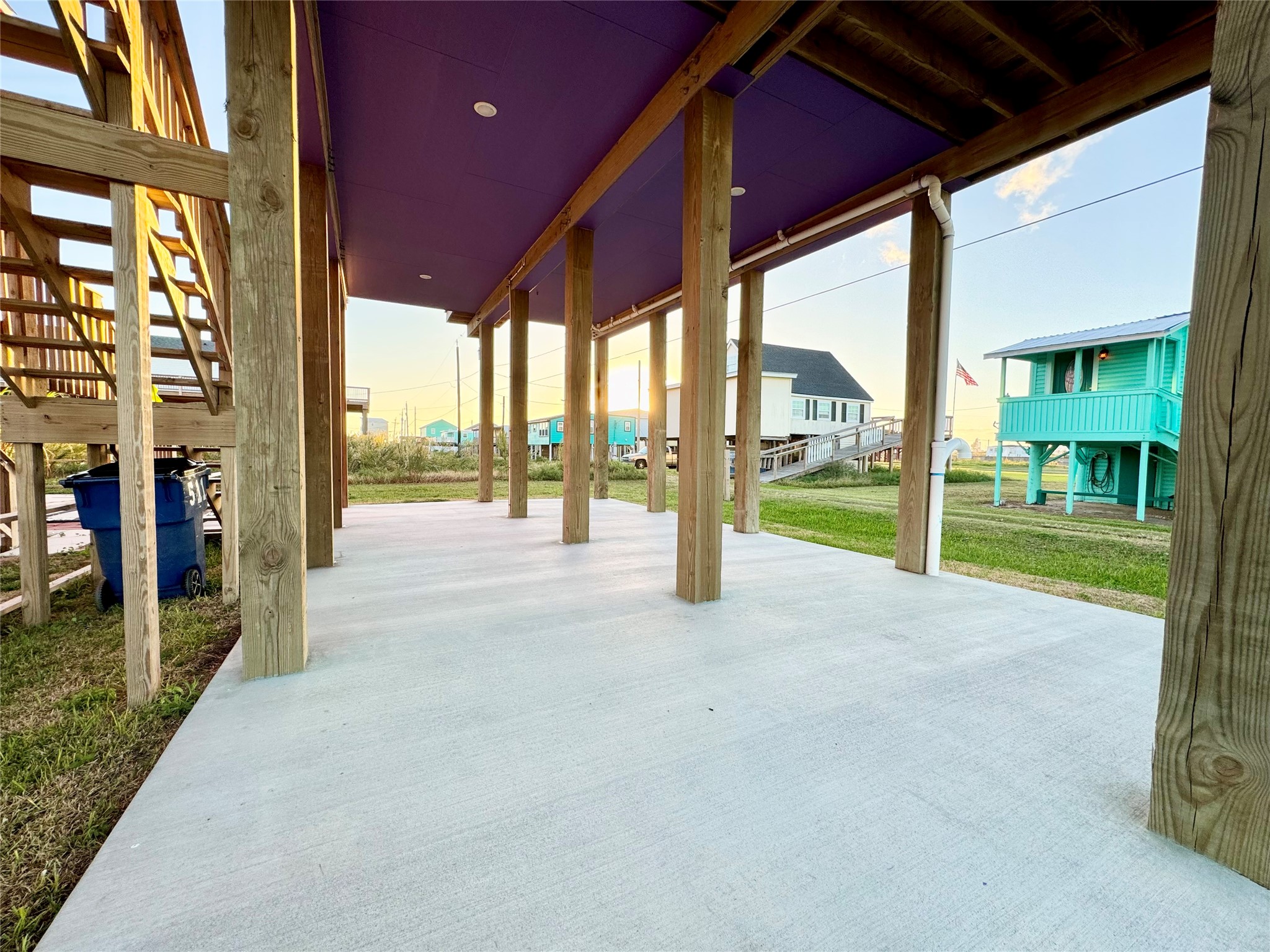 511 Caisson Street Surfside Beach, TX 77541 - Photo 28 of 33 a view of an apartment with a floor to ceiling window next to a yard