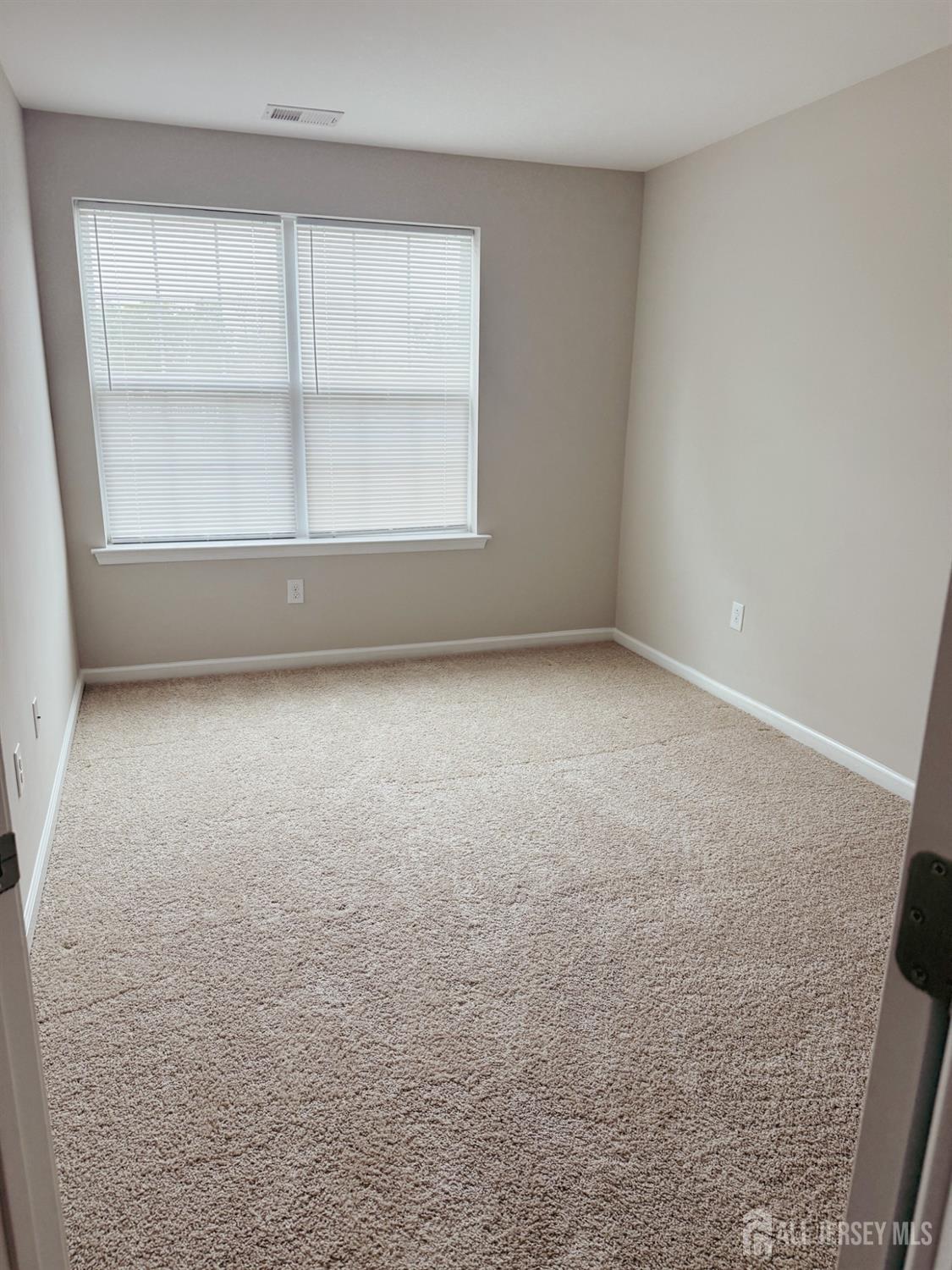 1101 Hights Farm Road North Monroe Township, NJ 08831 - Photo 14 of 38 an empty room with a empty space and window