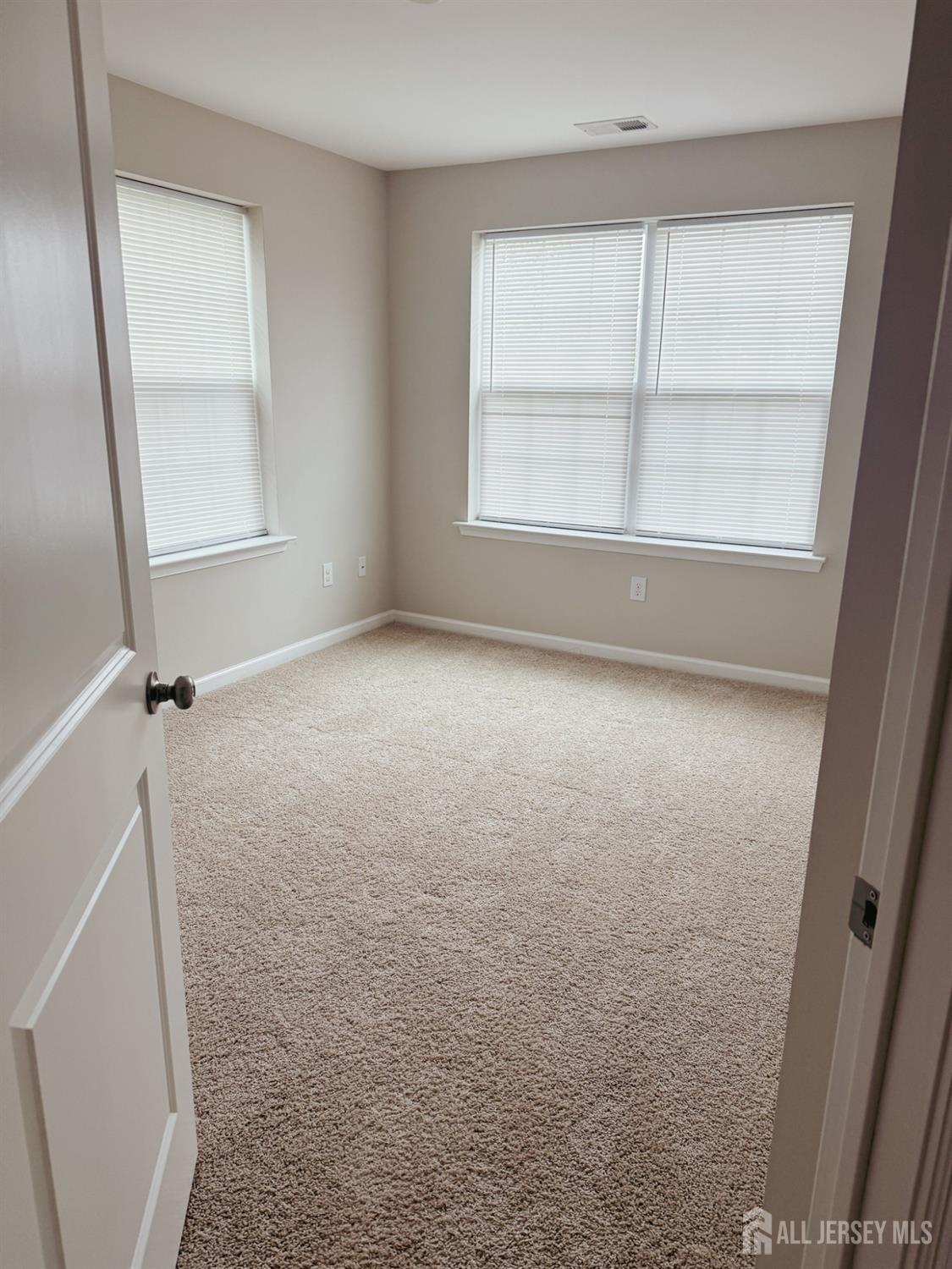1101 Hights Farm Road North Monroe Township, NJ 08831 - Photo 15 of 38 an empty room with a window
