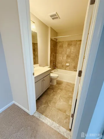 a utility room with washer and dryer