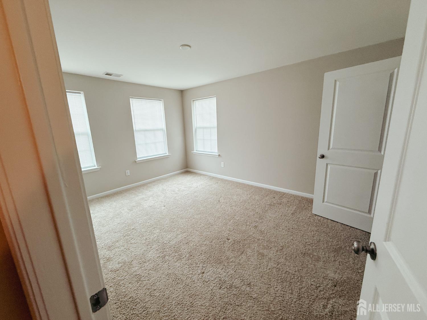 1101 Hights Farm Road North Monroe Township, NJ 08831 - Photo 19 of 38 a view of hallway with window and hardwood floor