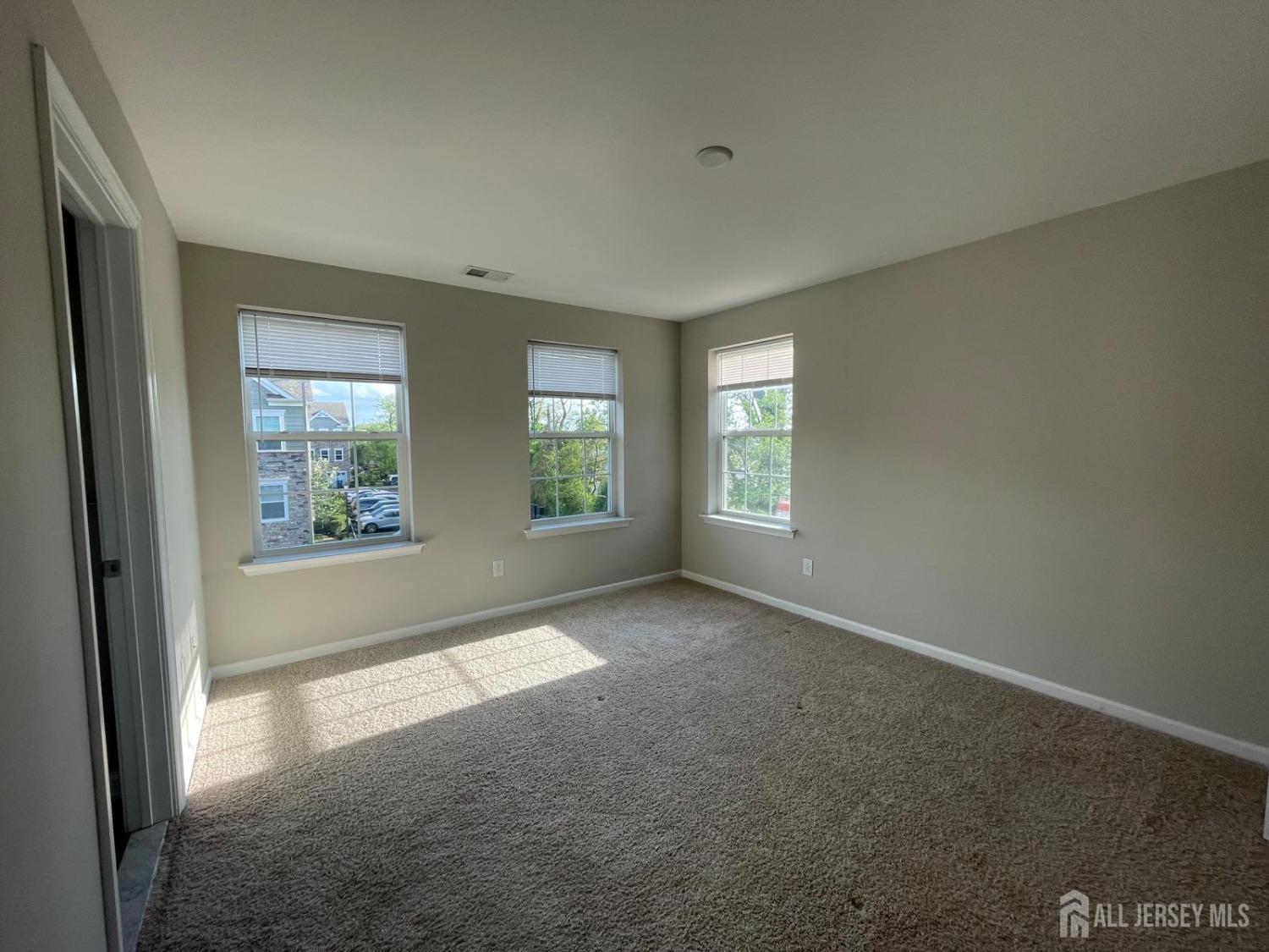 1101 Hights Farm Road North Monroe Township, NJ 08831 - Photo 27 of 38 an empty room with windows